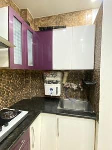 Kitchen Image of 650 Sq.ft 1.5 BHK Independent House for rent in Tri Nagar New Delhi for Rs. 20000