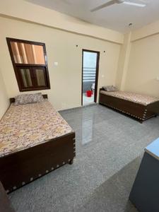 Bedroom Image of Roomsoom Pg in Sector 61, Noida