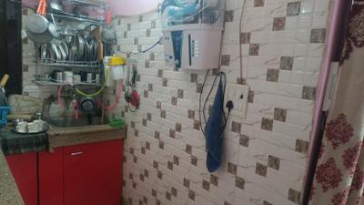 Kitchen Image of 370 Sq.ft 1 BHK Builder Floor for sale in Dwarka Mor New Delhi for Rs. 1650000