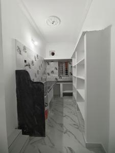 Kitchen Image of 2350 Sq.ft 4 BHK Independent House for sale in Thumukunta Secunderabad for Rs. 11500002