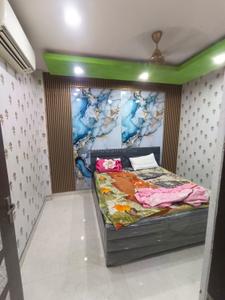 Bedroom Image of 950 Sq.ft 2 BHK Builder Floor for rent in Ramesh Nagar New Delhi for Rs. 28000