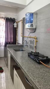 Kitchen Image of 850 Sq.ft 1 BHK Apartment / Flat for rent in Surya Kiran Aakash Homes, Ujala Circle Ahmedabad for Rs. 20999
