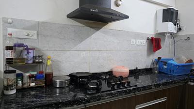 Kitchen Image of 950 Sq.ft 2 BHK Apartment / Flat for rent in Gera World Of Joy, Upper Kharadi Pune for Rs. 37000