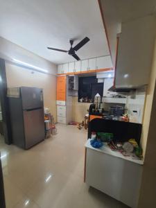 Kitchen Image of 950 Sq.ft 2 BHK Apartment / Flat for rent in Kharde Patil Chaitanya Vihar, Thergaon Pune for Rs. 30000