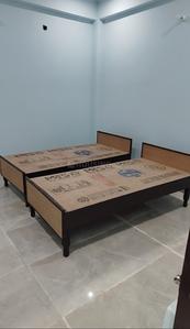 Bedroom Image of Rohit PG in Sector 135, Noida