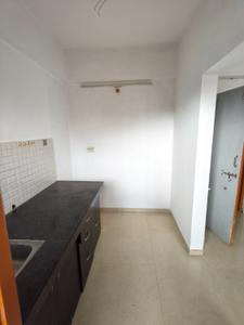 Kitchen Image of 700 Sq.ft 1 BHK Apartment / Flat for rent in Applewoods Satyesh Residency, Shela Ahmedabad for Rs. 15500