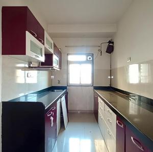Kitchen Image of 950 Sq.ft 2 BHK Apartment / Flat for rent in Rustomjee Urbania, Thane West Thane for Rs. 38000