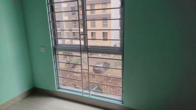 Bedroom Image of 930 Sq.ft 3 BHK Apartment / Flat for sale in Shapoorji Pallonji Houshing Complex, Rajarhat Kolkata for Rs. 6700000