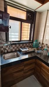 Kitchen Image of 1000 Sq.ft 2 BHK Independent House for rent in Airoli Navi Mumbai for Rs. 40000