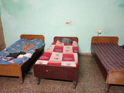 Bedroom Image of krishna Pg in Sector 11, Noida