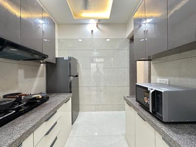 Kitchen Image of 1000 Sq.ft 2 BHK Apartment / Flat for sale in Mangeshi Dhara, Thakurli Thane for Rs. 7900000