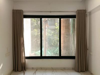 Living Room Image of 650 Sq.ft 1 BHK Apartment / Flat for sale in JP Codename Starlife, Mira Road East Mira Bhayandar for Rs. 7700000