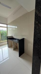Kitchen Image of 900 Sq.ft 2 BHK Apartment / Flat for sale in Mohan Alcoves I, Badlapur West Badlapur for Rs. 3800000