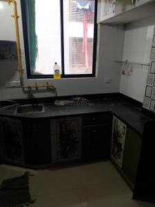 Kitchen Image of 1200 Sq.ft 1 BHK Apartment / Flat for rent in Sargasan Gandhinagar for Rs. 15000