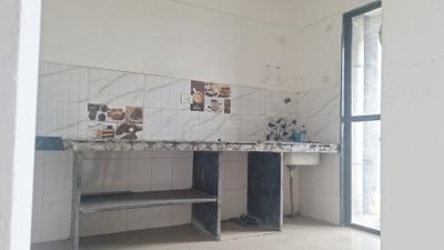 Kitchen Image of 600 Sq.ft 1 BHK Apartment / Flat for sale in Man Opus, Mira Road East Mira Bhayandar for Rs. 7300000
