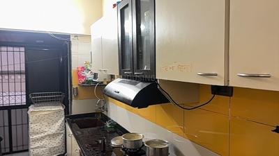 Kitchen Image of 980 Sq.ft 2 BHK Apartment / Flat for sale in Shiv Valley Apartment, Kalyan West Kalyan for Rs. 6351000