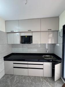Kitchen Image of 1310 Sq.ft 2 BHK Apartment / Flat for rent in Shreenathji Delta Riviera, Ulwe Navi Mumbai for Rs. 50000