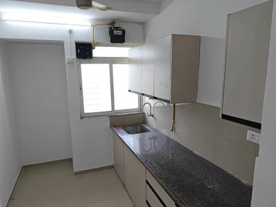 Kitchen Image of 800 Sq.ft 2 BHK Apartment / Flat for rent in Puraniks City Reserva Phase 1, Kasarvadavali Thane for Rs. 25000