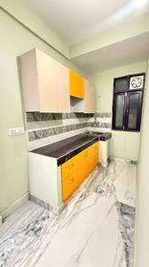 Kitchen Image of 950 Sq.ft 2 BHK Builder Floor for rent in Khirki Extension New Delhi for Rs. 32000