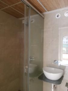 Common Bathroom Image of 550 Sq.ft 1 BHK Apartment / Flat for sale in Saiguru Uday Heights, Kharadi Pune for Rs. 7500000