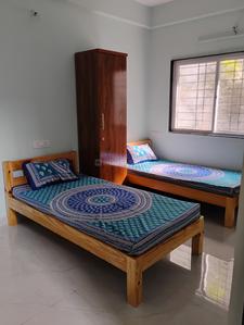 Bedroom Image of Vrinda Girls PG in Rahatani, Pune