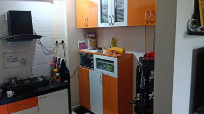 Kitchen Image of 666 Sq.ft 1 BHK Apartment / Flat for sale in SP Krishna Aangan Complex, Vasan Nagar Navi Mumbai for Rs. 4300000