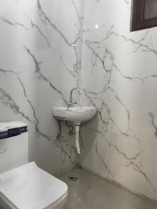 Common Bathroom Image of 900 Sq.ft 2 BHK Apartment / Flat for sale in Krishna Elite Homes, Noida Extension Greater Noida for Rs. 3745000