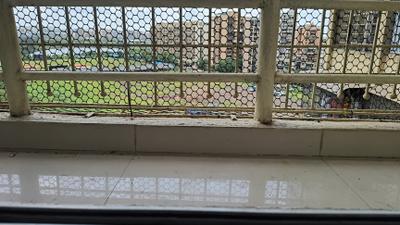 Balcony Image of 695 Sq.ft 1 BHK Apartment / Flat for rent in Gajra Bhoomi Gardenia, Kalamboli Navi Mumbai for Rs. 19000
