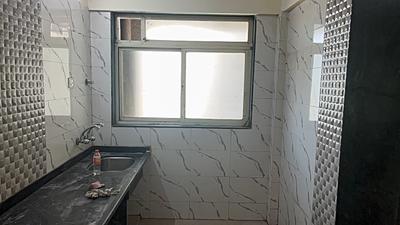 Kitchen Image of 960 Sq.ft 2 BHK Apartment / Flat for sale in Mohan Willows I, Badlapur East Badlapur for Rs. 3900000