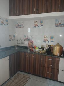 Kitchen Image of 900 Sq.ft 2 BHK Duplex for sale in Vagashi Anand for Rs. 2700000