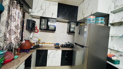 Kitchen Image of 990 Sq.ft 2 BHK Apartment / Flat for rent in Signature Vrajdham 2, Ujala Circle Ahmedabad for Rs. 26500