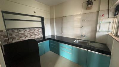 Kitchen Image of 950 Sq.ft 2 BHK Apartment / Flat for sale in Gulmohar Privilege, Kharadi Pune for Rs. 10500000