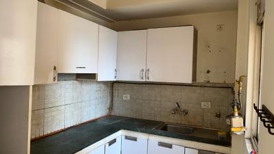 Kitchen Image of 950 Sq.ft 2 BHK Apartment / Flat for rent in Jaypee Kosmos, Sector 134 Noida for Rs. 24000