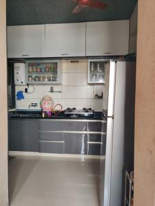 Kitchen Image of 1200 Sq.ft 2 BHK Apartment / Flat for rent in Aroma Tirupati Aakruti Greenz, Chharodi Ahmedabad for Rs. 30000
