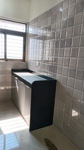Kitchen Image of 1200 Sq.ft 2.5 BHK Apartment / Flat for rent in Vishesh Balaji Symphony, Shilottar Raichur Navi Mumbai for Rs. 30000