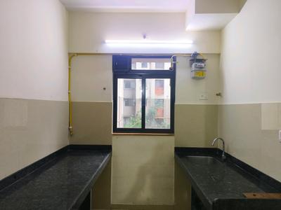 Kitchen Image of 940 Sq.ft 1 BHK Apartment / Flat for rent in Lodha Palava Lagoona A To F by Lodha Group, Palava Phase 2 Thane for Rs. 16000