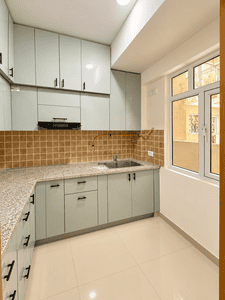 Kitchen Image of 955 Sq.ft 3 BHK Apartment / Flat for rent in Mahagun Mywoods Phase 3, Noida Extension Greater Noida for Rs. 22000