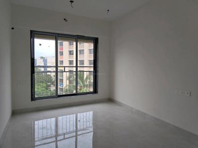Living Room Image of 575 Sq.ft 1 BHK Apartment / Flat for sale in Modibrick Gokulam, Dahisar West Mumbai for Rs. 9800000