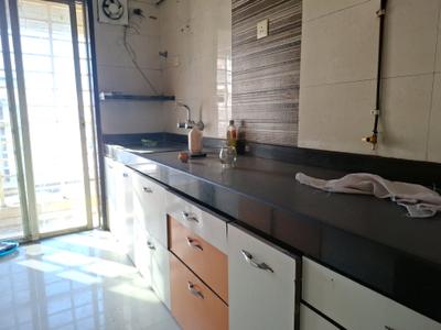 Kitchen Image of 670 Sq.ft 1 BHK Apartment / Flat for sale in Aaron Kanupriya, Kamothe Navi Mumbai for Rs. 6700000