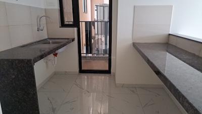 Kitchen Image of 980 Sq.ft 2 BHK Apartment / Flat for sale in Mahindra Nestalgia, Pimpri Pune for Rs. 10500000