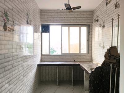 Kitchen Image of 650 Sq.ft 1 BHK Apartment / Flat for sale in Saras Residency, Dombivli East Thane for Rs. 4000000