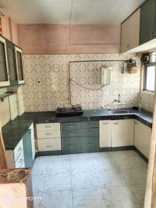 Kitchen Image of 800 Sq.ft 2 BHK Apartment / Flat for rent in Warje Pune for Rs. 24000