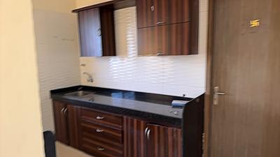 Kitchen Image of 660 Sq.ft 1 BHK Apartment / Flat for rent in Vishesh Balaji Symphony Wing I to K, Shilottar Raichur Navi Mumbai for Rs. 18500