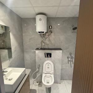 Bathroom Image of 670 Sq.ft 1 RK Studio for rent in Noida Extension Greater Noida for Rs. 37000