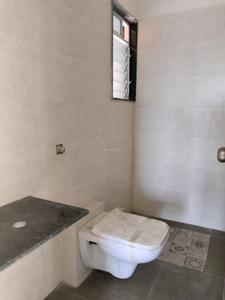 Common Bathroom Image of 700 Sq.ft 1 BHK Apartment / Flat for sale in Uma Elements Building B Vayu, Daighar Gaon Thane for Rs. 3850000