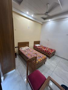 Bedroom Image of Grihum pg in Sector 56, Noida