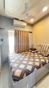 Bedroom Image of 985 Sq.ft 2 BHK Apartment / Flat for sale in Centrio Nx By Mj Shah, Chedda Nagar Mumbai for Rs. 17500000
