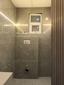 Common Bathroom Image of 700 Sq.ft 1.5 BHK Apartment / Flat for sale in Trinity High Street North Avenue, Noida Extension Greater Noida for Rs. 3899000