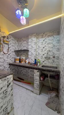 Kitchen Image of 720 Sq.ft 2 BHK Builder Floor for rent in Nawada New Delhi for Rs. 20500