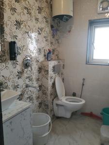 Common Bathroom Image of 370 Sq.ft 1 RK Apartment / Flat for rent in DLF Capital Greens Phase 1 And 2, Karampura New Delhi for Rs. 25000